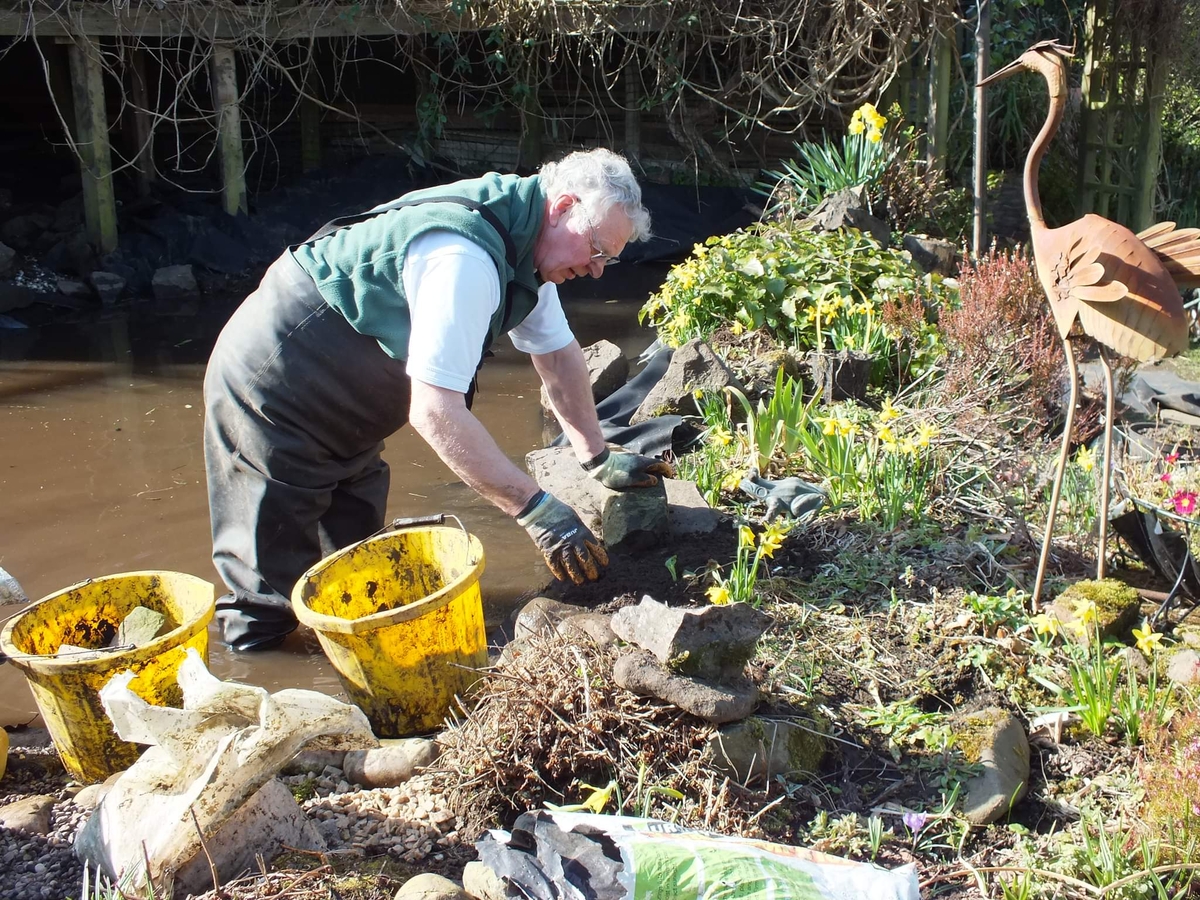 Ewen in his waders in the pond